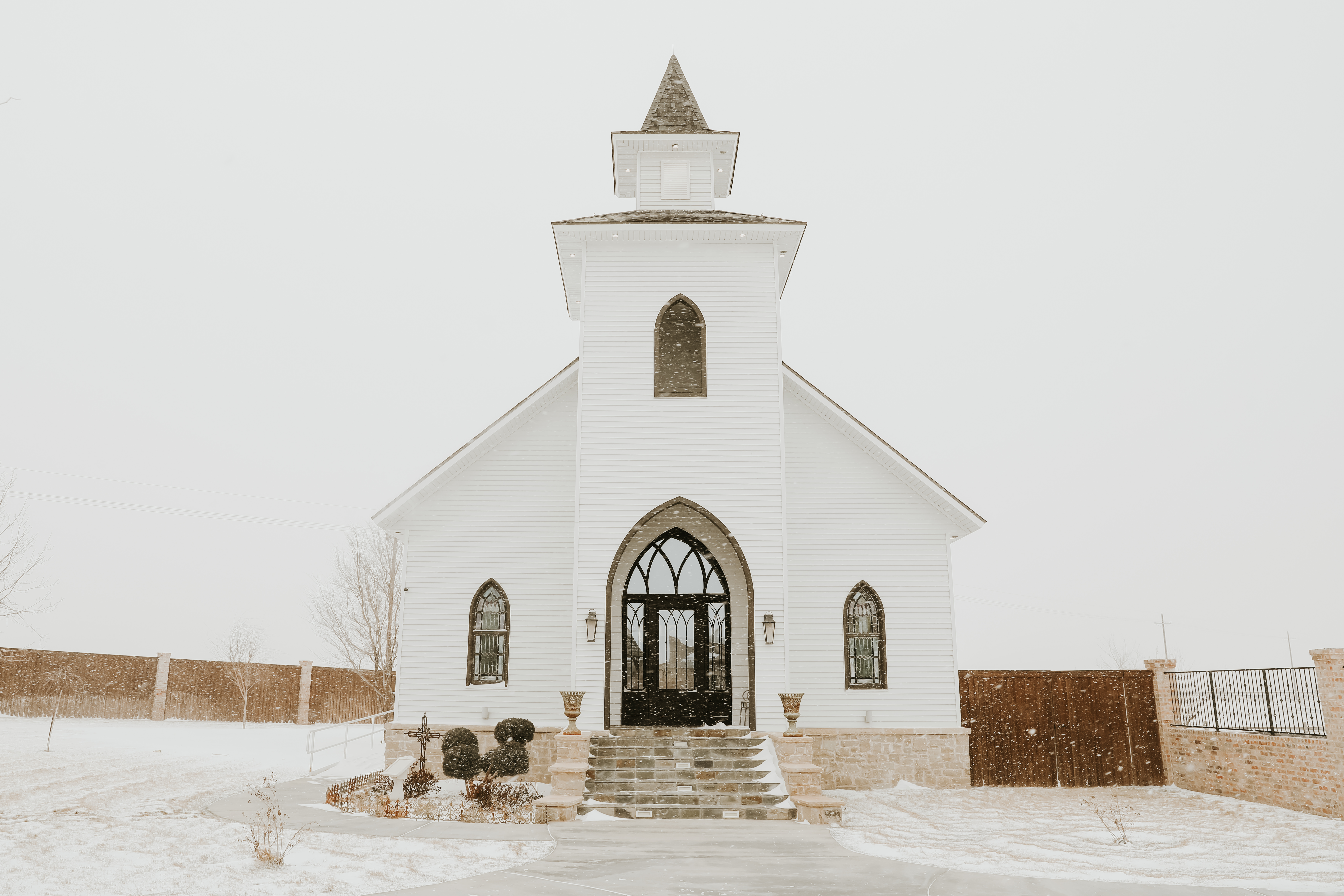 white wedding chapel in the snow